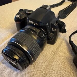 Nikon D40 + 18-55mm Lens